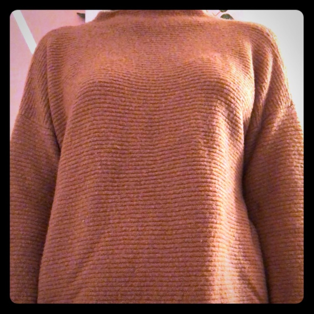 Low rise turtleneck sweater.